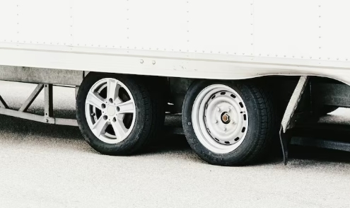 Selecting painted trailer wheel hinges on trailer