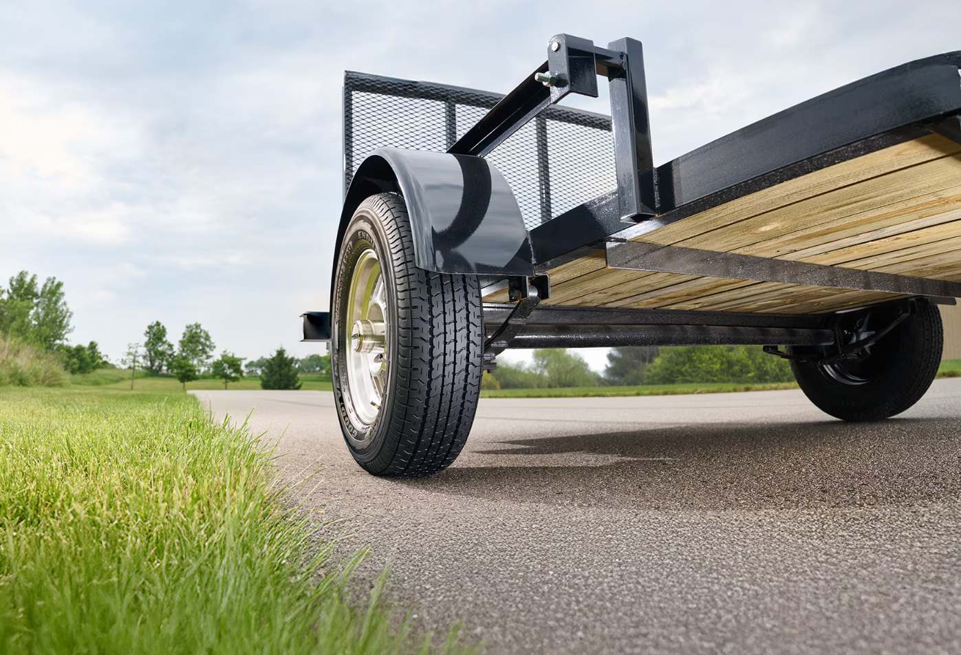 reviewing the numbers and close-up signs of trailer tire for solid safety