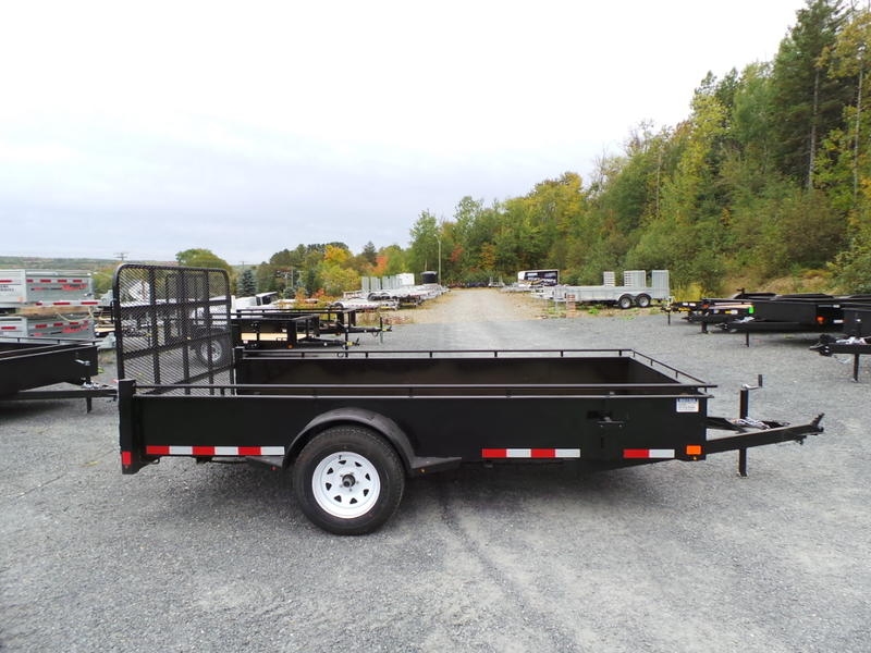 Dark grey double-axle livestock trailer